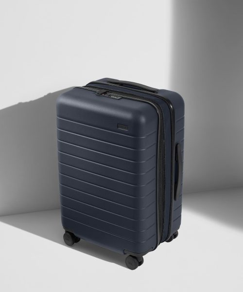 The Bigger Carry-On Flex in Navy Blue