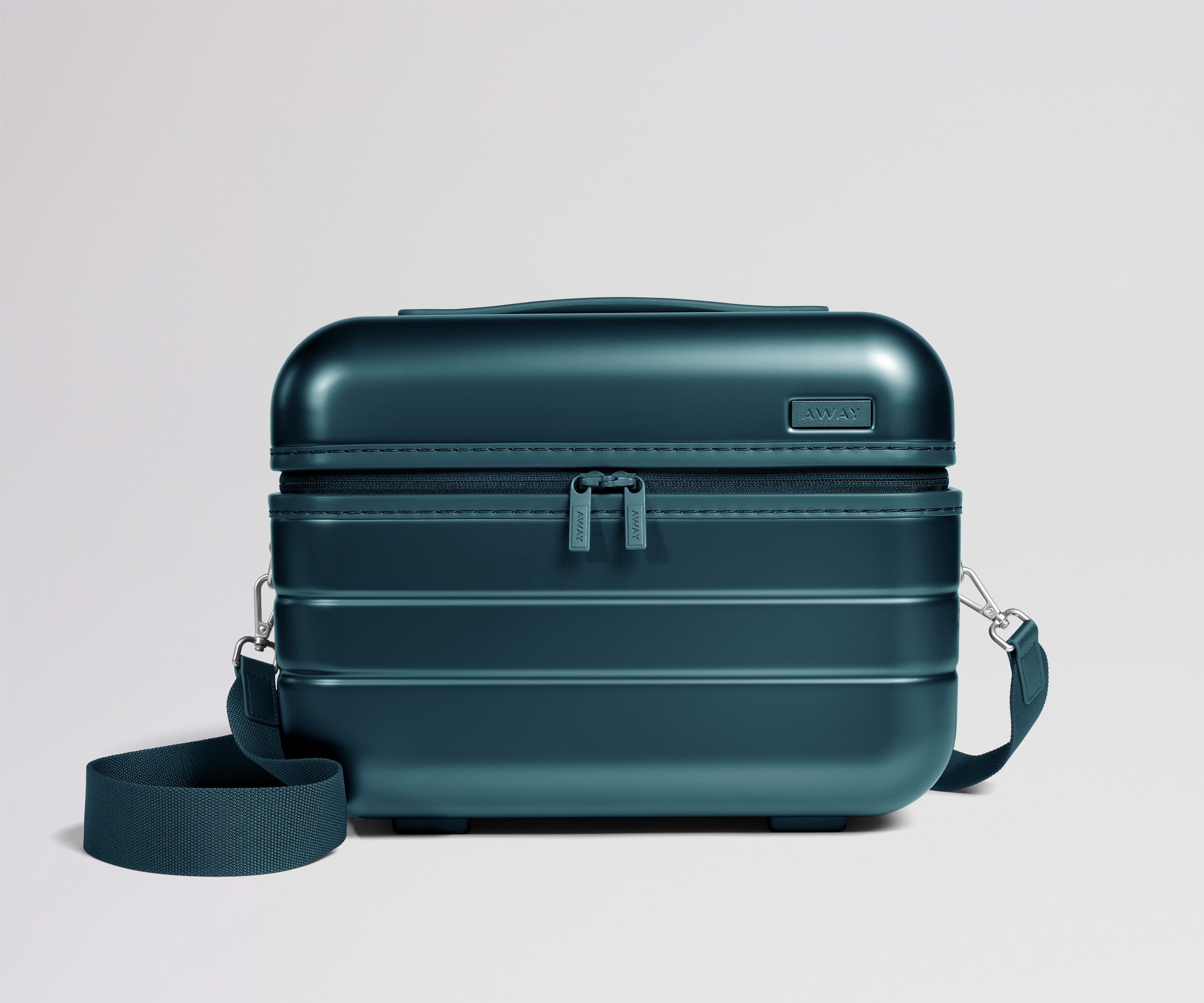 PDP_Holiday_TrainCase_Teal_01.jpg