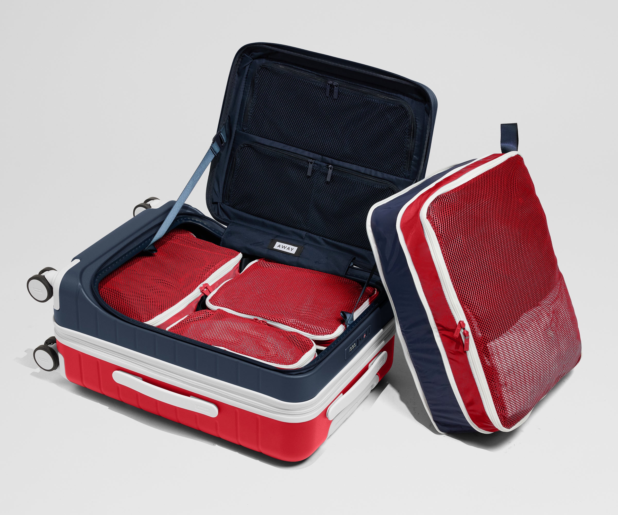 PDP_Summer_PackingCubes_Compression_Navy-Cherry_03.jpg